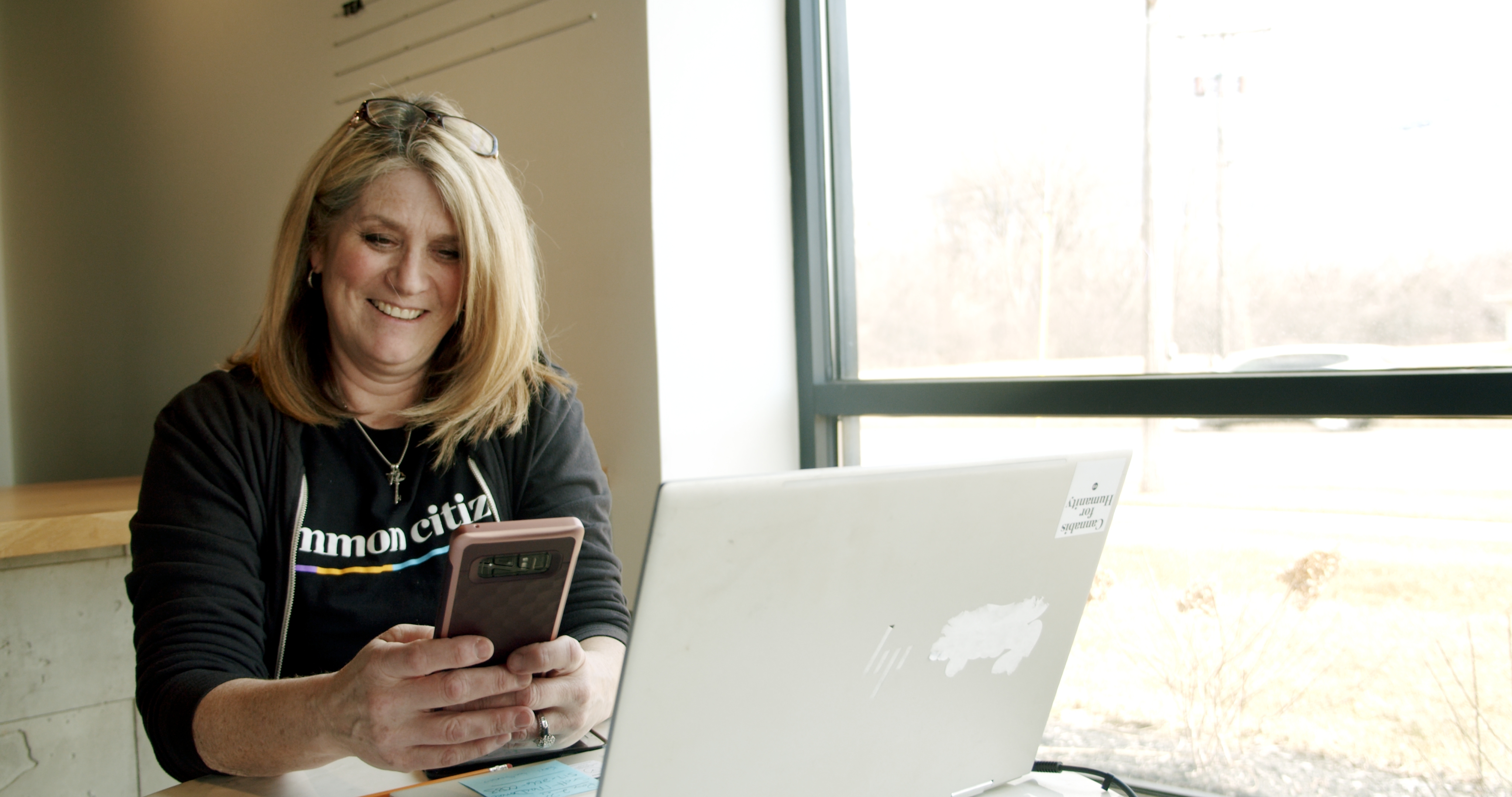 Marla Wald checks the View dispensary data app from her phone